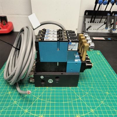 Four-Station Manifold with Multi-Pin Electrical Handoff Four-Station Manifold with Multi-Pin Electrical Handoff
